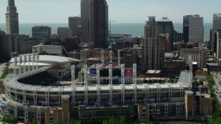 AX106_222 - 4.8K stock footage aerial video orbiting Progressive Field baseball stadium in Downtown Cleveland, Ohio