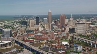 AX106_244E - 4.8K aerial stock footage of approaching tall skyscrapers in Downtown Cleveland, Ohio