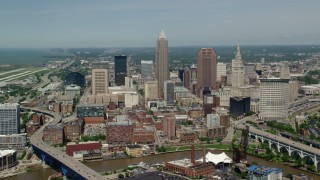 AX106_246 - 4.8K stock footage aerial video approaching skyscrapers in Downtown Cleveland, Ohio