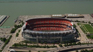 AX106_250E - 4.8K aerial stock footage of FirstEnergy Stadium, formerly Cleveland Browns Football Stadium in Downtown Cleveland, Ohio