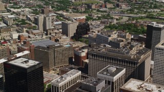 AX106_252 - 4.8K aerial stock footage flying by office buildings in Downtown Cleveland, Ohio