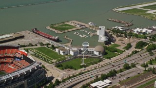 AX106_263 - 4.8K aerial stock footage of the Rock and Roll Hall of Fame in Downtown Cleveland, Ohio