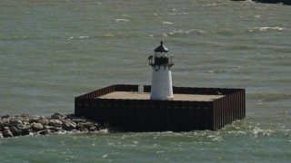 AX107_013 - 4.8K aerial stock footage of lighthouses on Lake Erie, Cleveland, Ohio