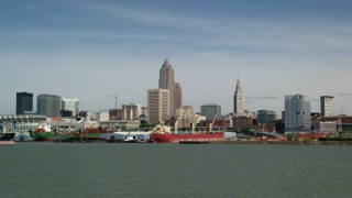 AX107_015 - 4.8K aerial stock footage of Downtown Cleveland skyline seen from Lake Erie, Ohio