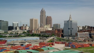 AX107_016 - 4.8K stock footage aerial video of Downtown Cleveland skyline from the shores of Lake Erie, Ohio