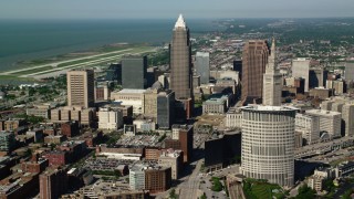 AX107_035 - 4.8K stock footage aerial video of Key Tower and 200 Public Square among city buildings, Downtown Cleveland, Ohio