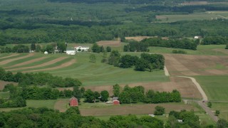 AX107_080 - 4.8K aerial stock footage of farms and farmland, Mantua, Ohio