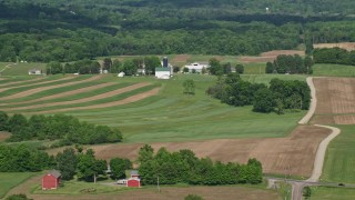 AX107_080E - 4.8K aerial stock footage of farms and farmland, Mantua, Ohio