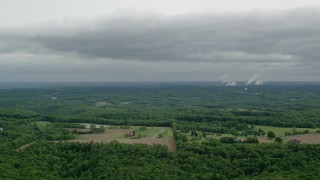 AX107_126 - 4.8K aerial stock footage of farms, forests and Beaver Valley Power Station, Pennsylvania