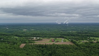 AX107_126E - 4.8K aerial stock footage of farms, forests and Beaver Valley Power Station, Pennsylvania