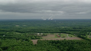 AX107_127 - 4.8K aerial stock footage of forests and Beaver Valley Power Station, Pennsylvania