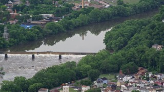 AX107_131 - 4.8K aerial stock footage of a dam on a river, Beaver Falls, Pennsylvania