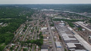 AX107_146E - 4.8K aerial stock footage of homes and small factories, Ambridge, Pennsylvania