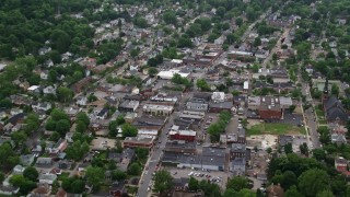 AX107_153E - 4.8K aerial stock footage of a small town among trees, Sewickley, Pennsylvania