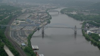 AX107_164 - 4.8K aerial stock footage of McKees Rocks Bridge spanning Ohio River, Pittsburgh