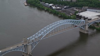 AX107_164E - 4.8K aerial stock footage of McKees Rocks Bridge spanning Ohio River, Pittsburgh