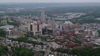 AX107_180 - 4.8K aerial stock footage of the University of Pittsburgh and Cathedral of Learning, Pennsylvania