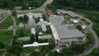 AX107_186 - 4.8K stock footage aerial video of Phipps Conservatory & Botanical Gardens, Pittsburgh, Pennsylvania