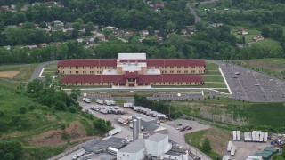 AX107_208 - 4.8K aerial stock footage orbiting an elementary school, Penn Hills, Pennsylvania