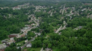 AX107_210 - 4.8K aerial stock footage of suburban homes and trees, Penn Hills, Pennsylvania