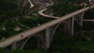 AX108_014 - 4K aerial stock footage flying over light traffic on the George Westinghouse Bridge; Pittsburgh, Pennsylvania