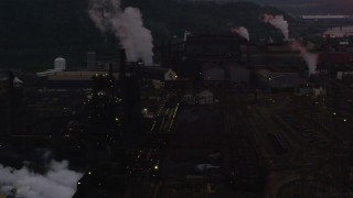 AX108_037 - 4K aerial stock footage of U.S. Steel Mon Valley Works, Braddock, Pennsylvania, twilight