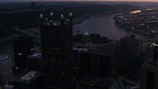 AX108_084E - 4K aerial stock footage approaching PPG Place revealing Point State Park, Downtown Pittsburgh, Pennsylvania, twilight