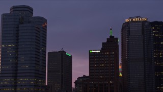 AX108_131 - 4K aerial stock footage looking up to the top of the Grant Building, Downtown Pittsburgh, twilight