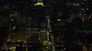 AX108_208 - 4K aerial stock footage of a medium shot of skyscrapers, Downtown Pittsburgh, Pennsylvania, night
