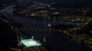 AX108_209 - 4K aerial stock footage approaching Point State Park, Downtown Pittsburgh, night