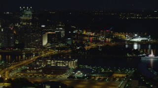 AX108_215 - 4K aerial stock footage of Point State Park and Heinz Field, Pittsburgh, night
