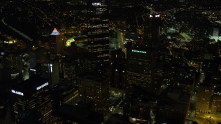 AX108_237E - 4K aerial stock footage flying through the center of Downtown Pittsburgh, Pennsylvania, night