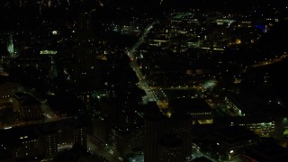 AX108_243E - 4K aerial stock footage flying over University of Pittsburgh campus, Pittsburgh, Pennsylvania, night