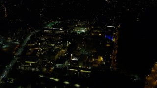 AX108_245 - 4K aerial stock footage approaching Carnegie Mellon University, Pittsburgh, Pennsylvania, night