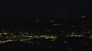 AX108_248 - 4K aerial stock footage of residential neighborhoods, Pittsburgh, Pennsylvania, night