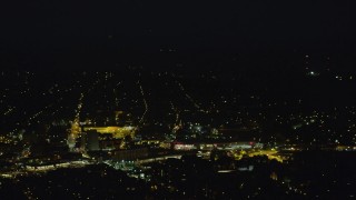 AX108_249 - 4K aerial stock footage flying by residential neighborhoods, Pittsburgh, Pennsylvania, night