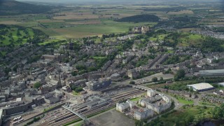 AX109_028E - 5.5K aerial stock footage of historic Stirling Castle and residential area, Scotland
