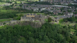 AX109_038E - 5.5K aerial stock footage orbiting historic Stirling Castle and grounds with tourists, Scotland