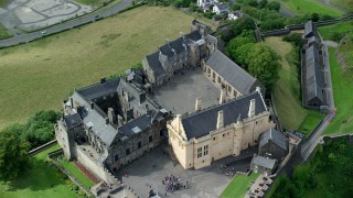 AX109_041 - 5.5K stock footage aerial video orbiting Stirling Castle and its grounds, Scotland