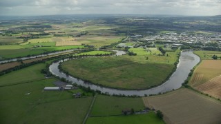 AX109_101 - 5.5K aerial stock footage of River Forth and farmland, Stirling, Scotland