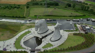 AX109_131 - 5.5K aerial stock footage of The Kelpies sculptures in Falkirk, Scotland