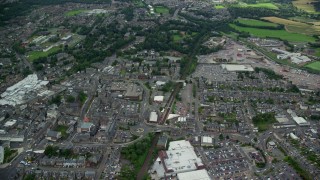 AX109_155E - 5.5K aerial stock footage fly over homes and streets in Falkirk, Scotland