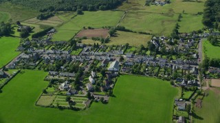 AX110_042 - 5.5K aerial stock footage fly over small Scottish village, Gartmore, Scotland