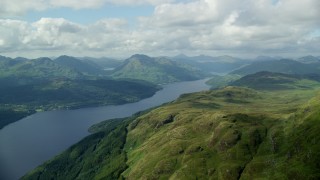 AX110_057E - 5.5K aerial stock footage of Loch Lomond in the Scottish Highlands, Scotland