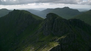 AX110_075 - 5.5K aerial stock footage of The Cobbler, a green peak, Scottish Highlands, Scotland