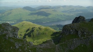AX110_078 - 5.5K aerial stock footage of orbiting The Cobbler with views of Loch Long, Scottish Highlands, Scotland