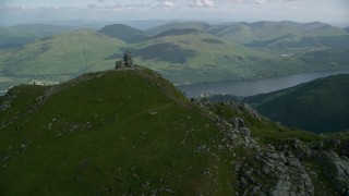 AX110_079 - 5.5K aerial stock footage of orbiting The Cobbler with views of Loch Long, Scottish Highlands, Scotland