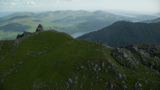 AX110_079E - 5.5K aerial stock footage of orbiting The Cobbler Mountain, Scottish Highlands, Scotland