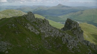 AX110_080 - 5.5K stock footage aerial video of orbiting The Cobbler Mountain, Scottish Highlands, Scotland