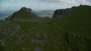 AX110_086E - 5.5K aerial stock footage of flying over The Cobbler mountain to reveal Loch Long, Scottish Highlands, Scotland